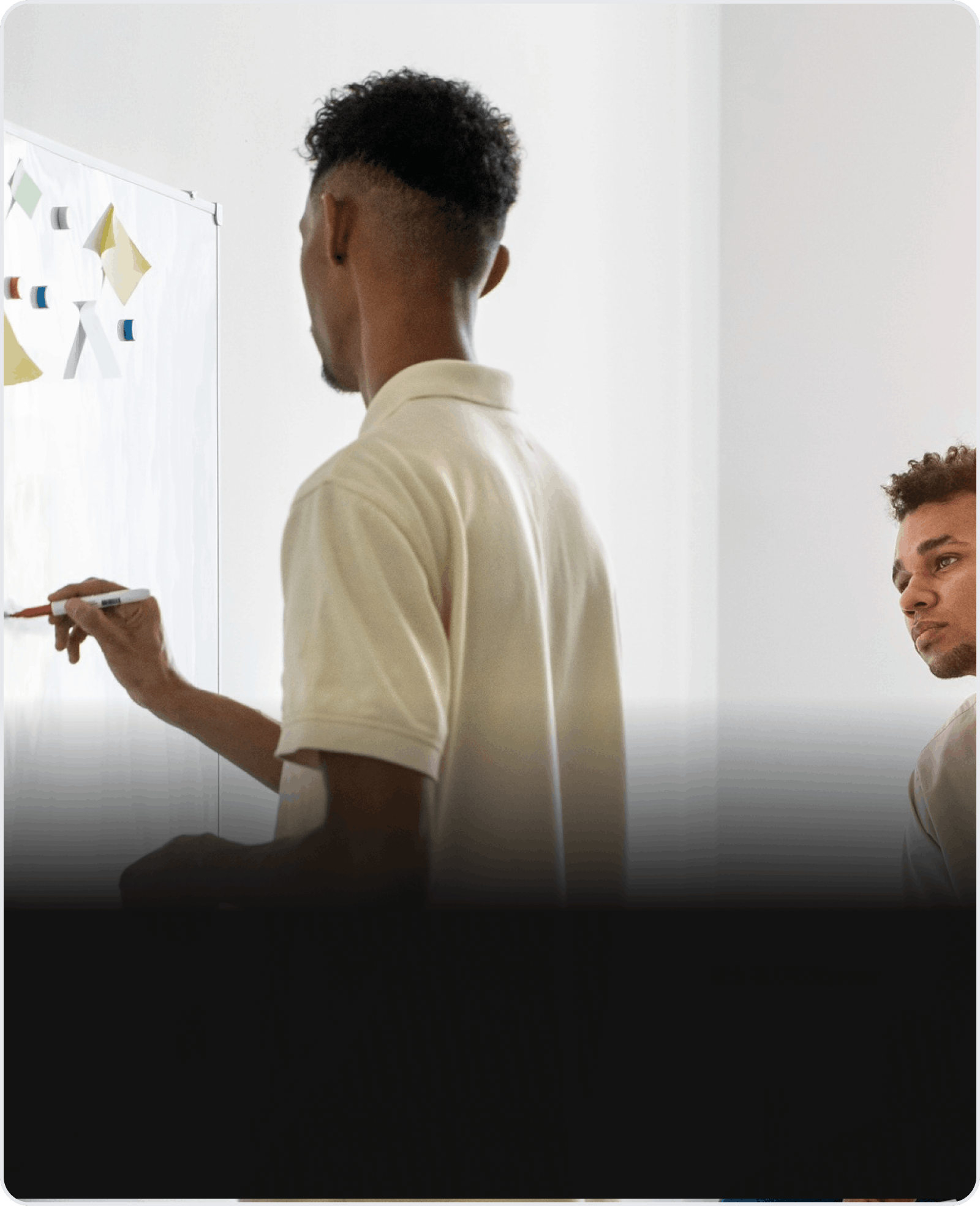 Mentor presenting ideas to a colleague