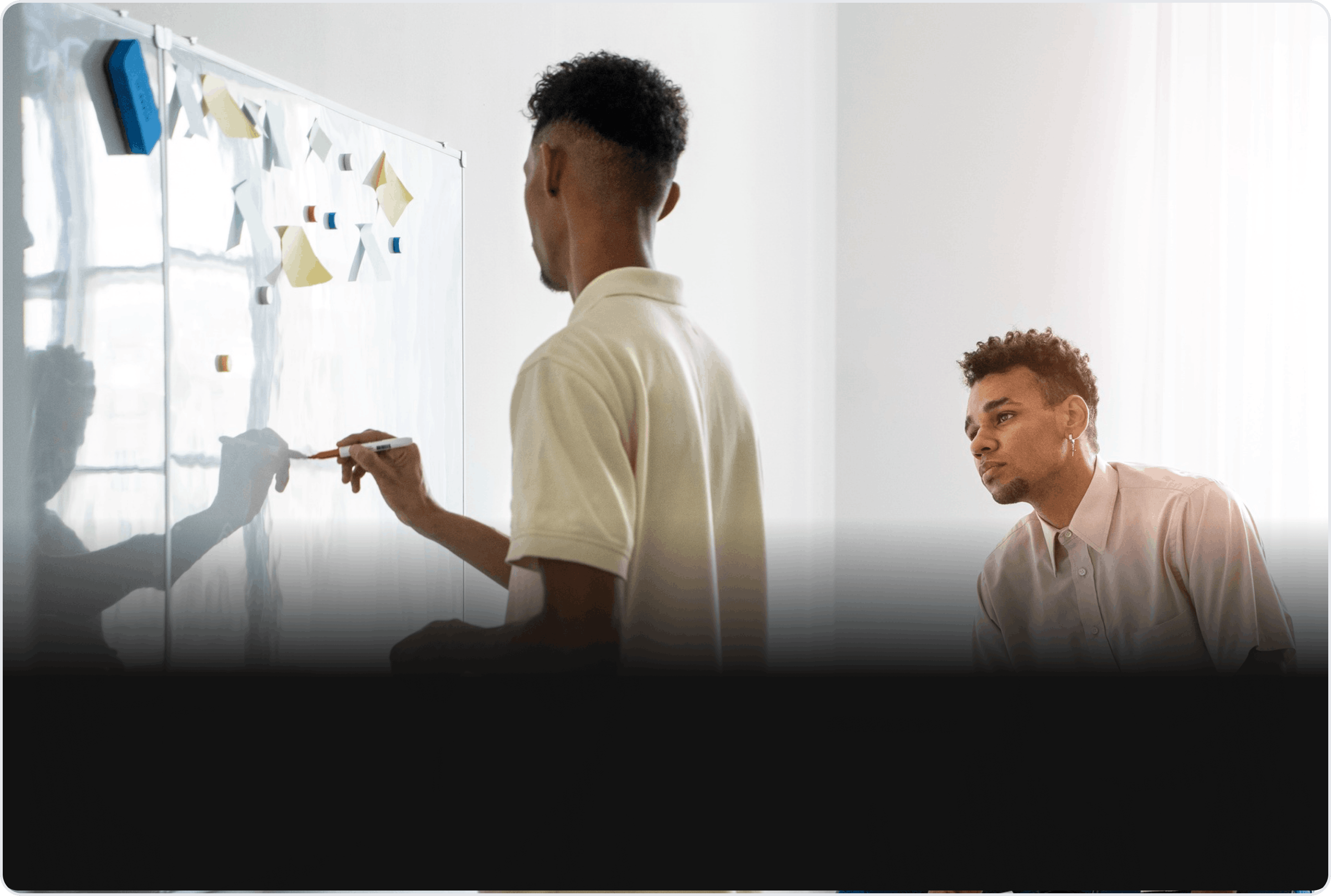Mentor presenting ideas to a colleague